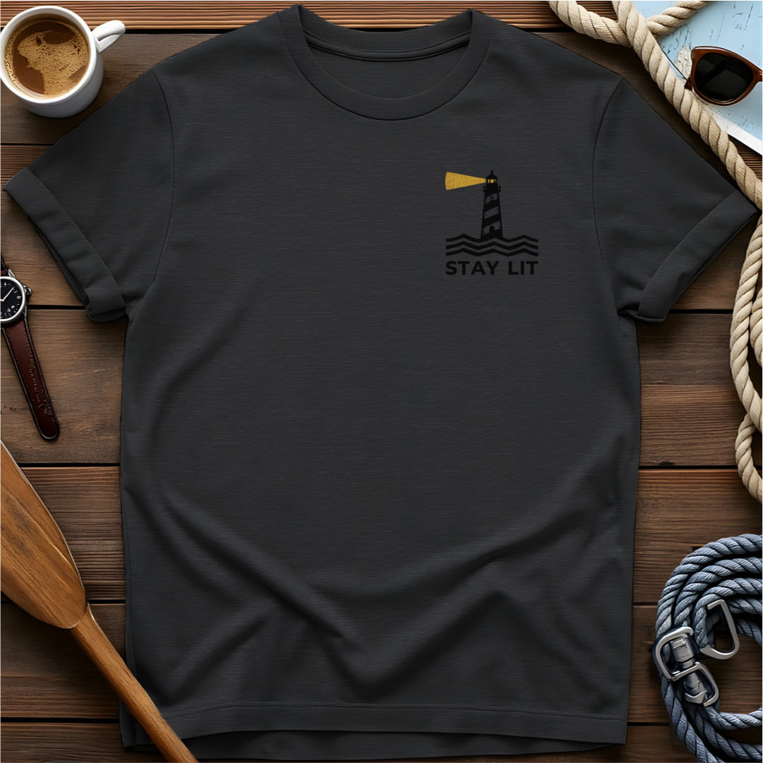 T-shirt with a lighthouse and waves above the words "Stay Lit."