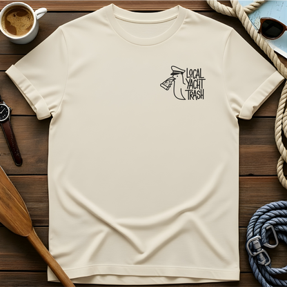 T-shirt with a line-drawn seagull in a captain's hat eating pizza, beside the words "Local Yacht Trash."