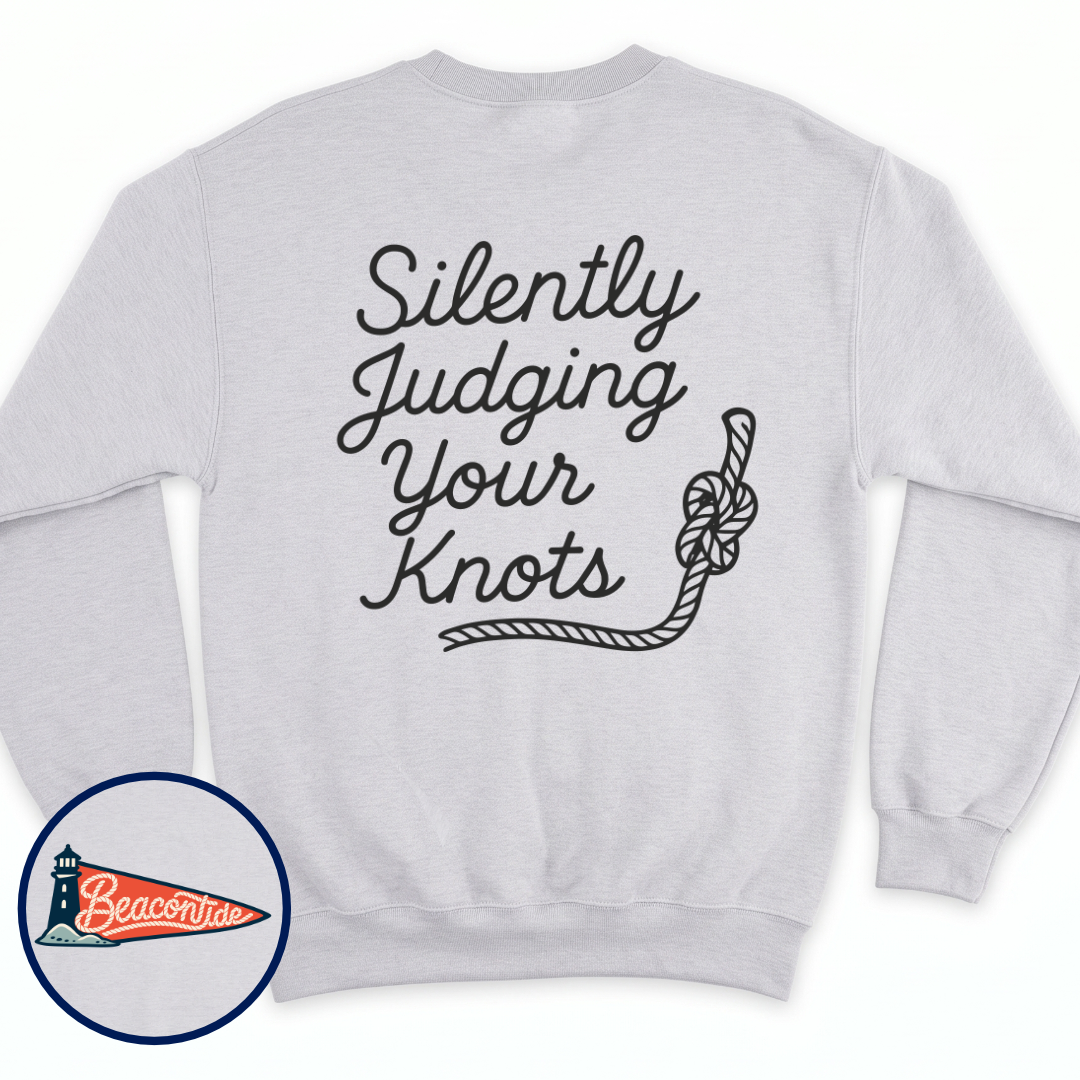 Silently Judging Knots crewneck sweatshirt in Ash, back view — script lettering Silently Judging Your Knots with a knotted rope, BeaconTide
