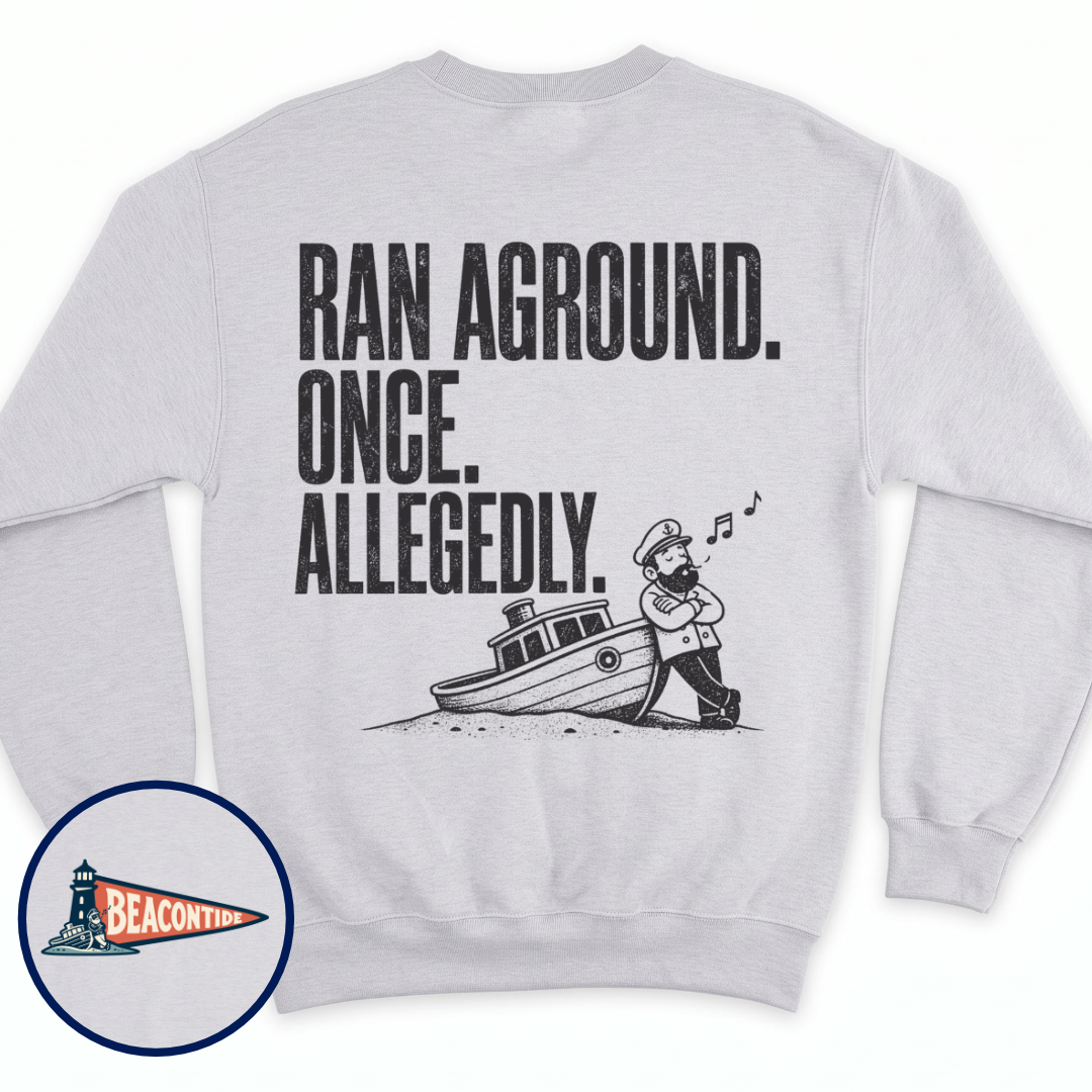 Allegedly Ran Aground crewneck sweatshirt in Ash, back view — Ran Aground. Once. Allegedly. with a captain leaning on a grounded boat, BeaconTide