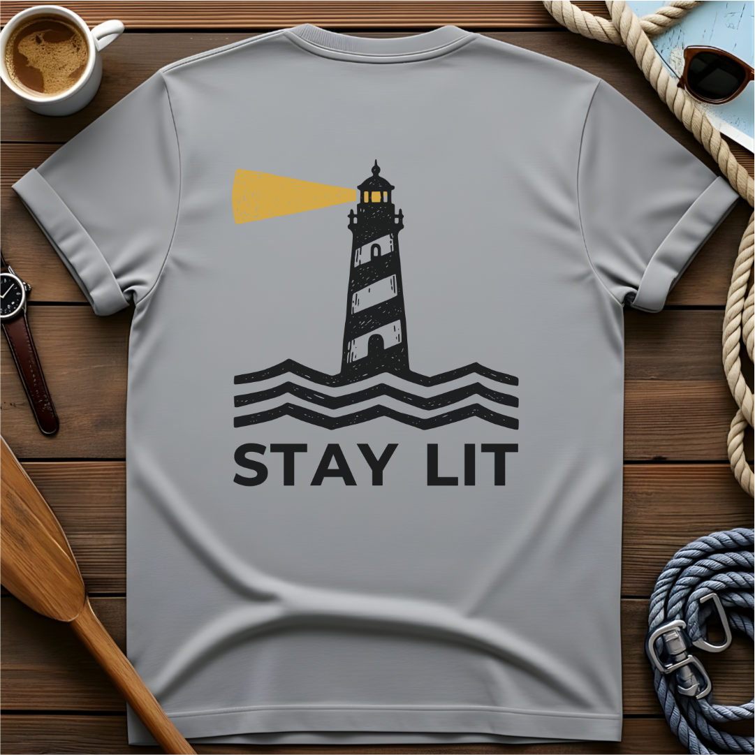 T-shirt with a lighthouse and waves above the words "Stay Lit."