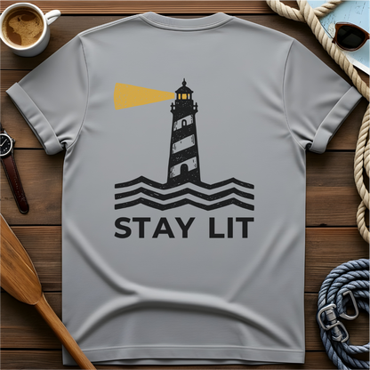 T-shirt with a lighthouse and waves above the words "Stay Lit."
