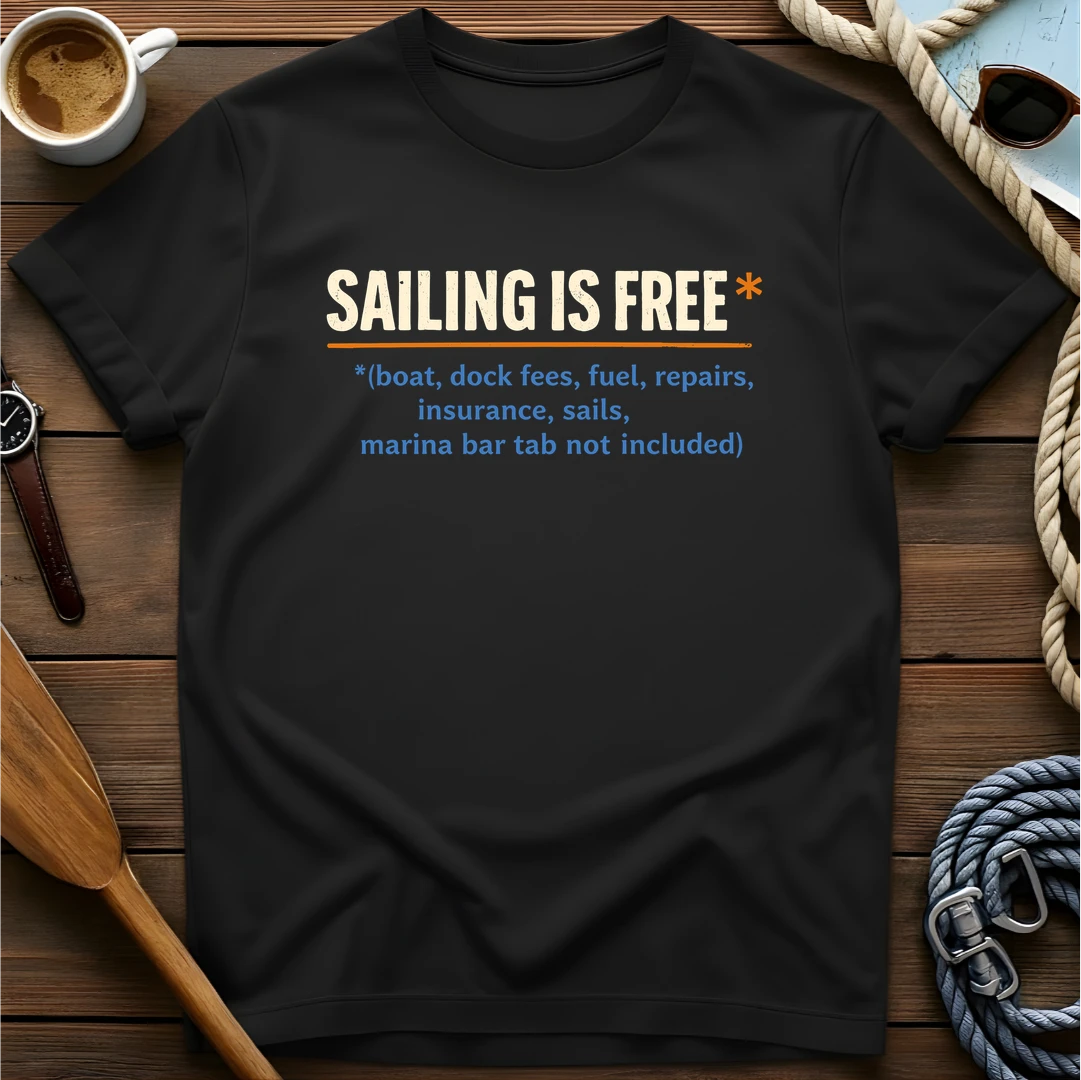 T-shirt with a definition-style design reading "Sailing Is Free" with fine print listing all the costs that aren't included.