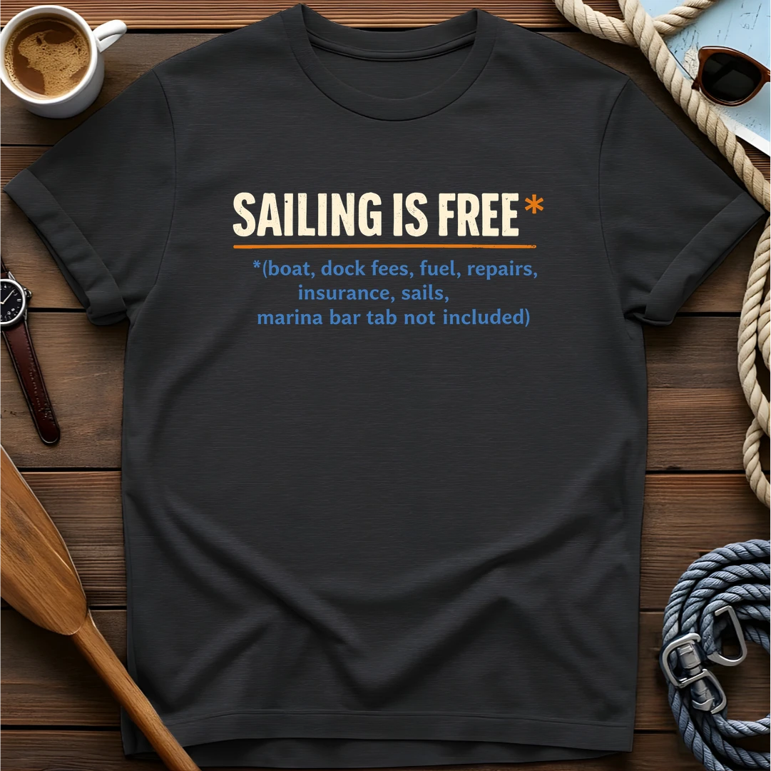 T-shirt with a definition-style design reading "Sailing Is Free" with fine print listing all the costs that aren't included.