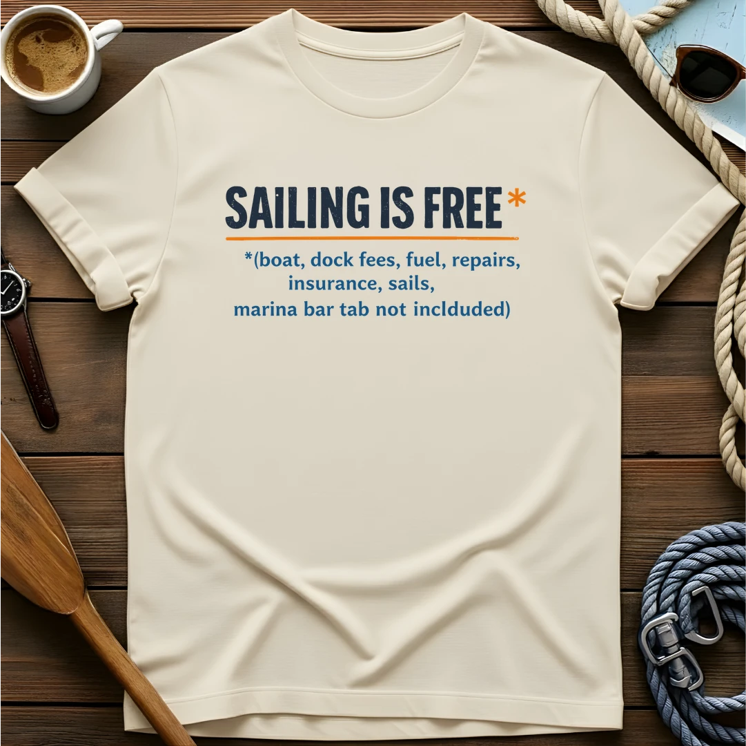 T-shirt with a definition-style design reading "Sailing Is Free" with fine print listing all the costs that aren't included.