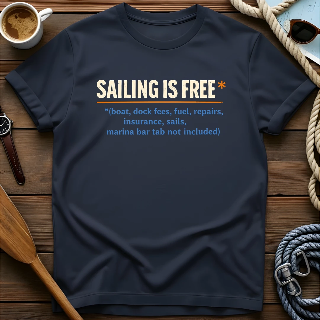 T-shirt with a definition-style design reading "Sailing Is Free" with fine print listing all the costs that aren't included.