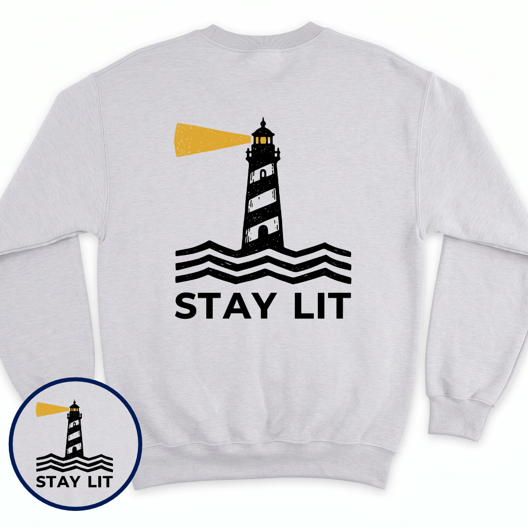 Stay Lit crewneck sweatshirt in Ash, back view — lighthouse graphic with the line Stay Lit, BeaconTide