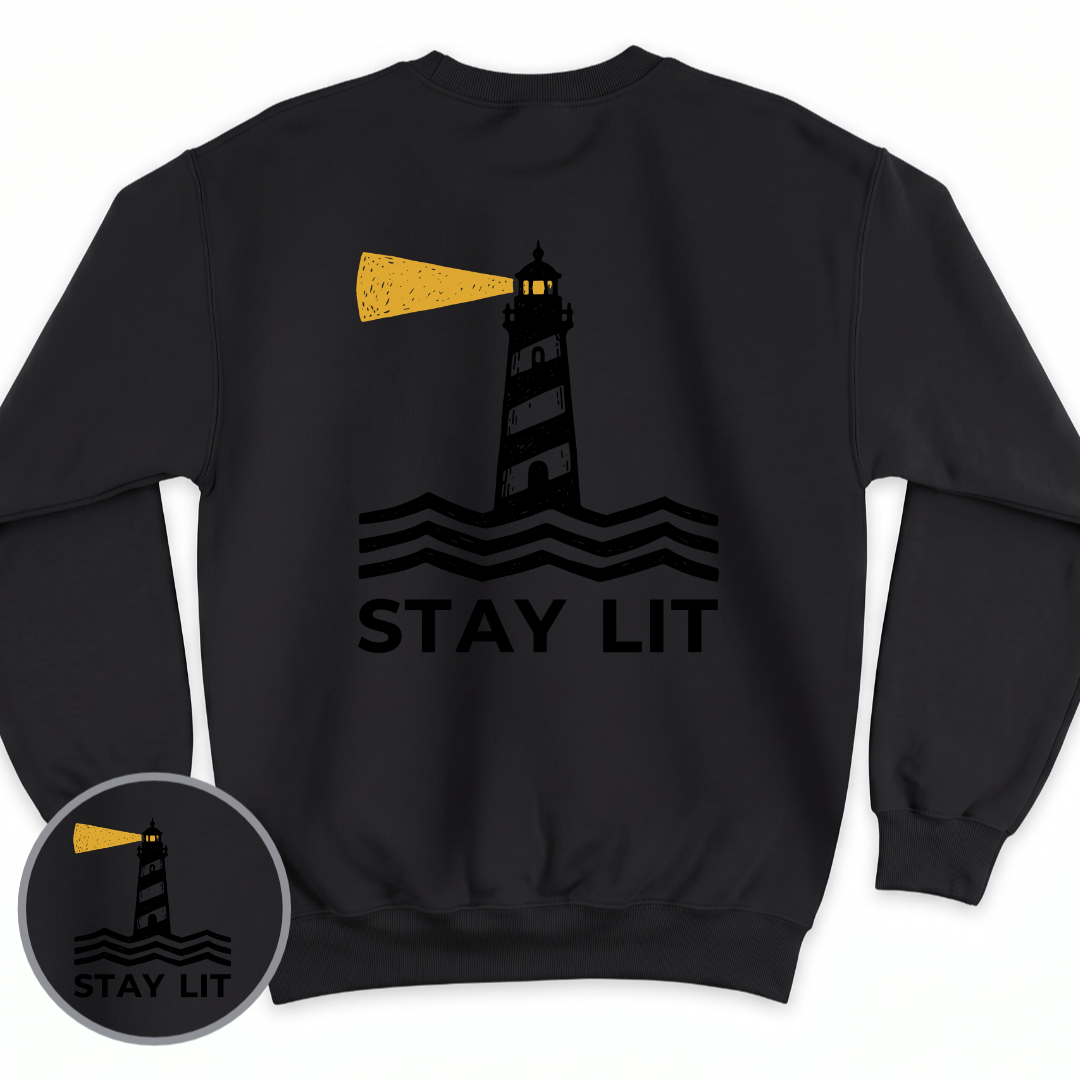 Stay Lit crewneck sweatshirt in Black, back view — lighthouse graphic with the line Stay Lit, BeaconTide
