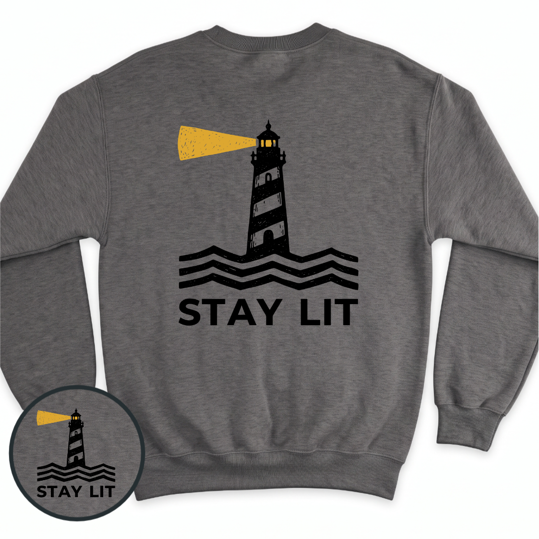 Stay Lit crewneck sweatshirt in Dark Heather, back view — lighthouse graphic with the line Stay Lit, BeaconTide